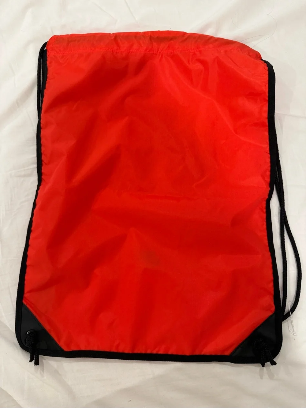 Nike Red Drawstring Backpack with Black Trim